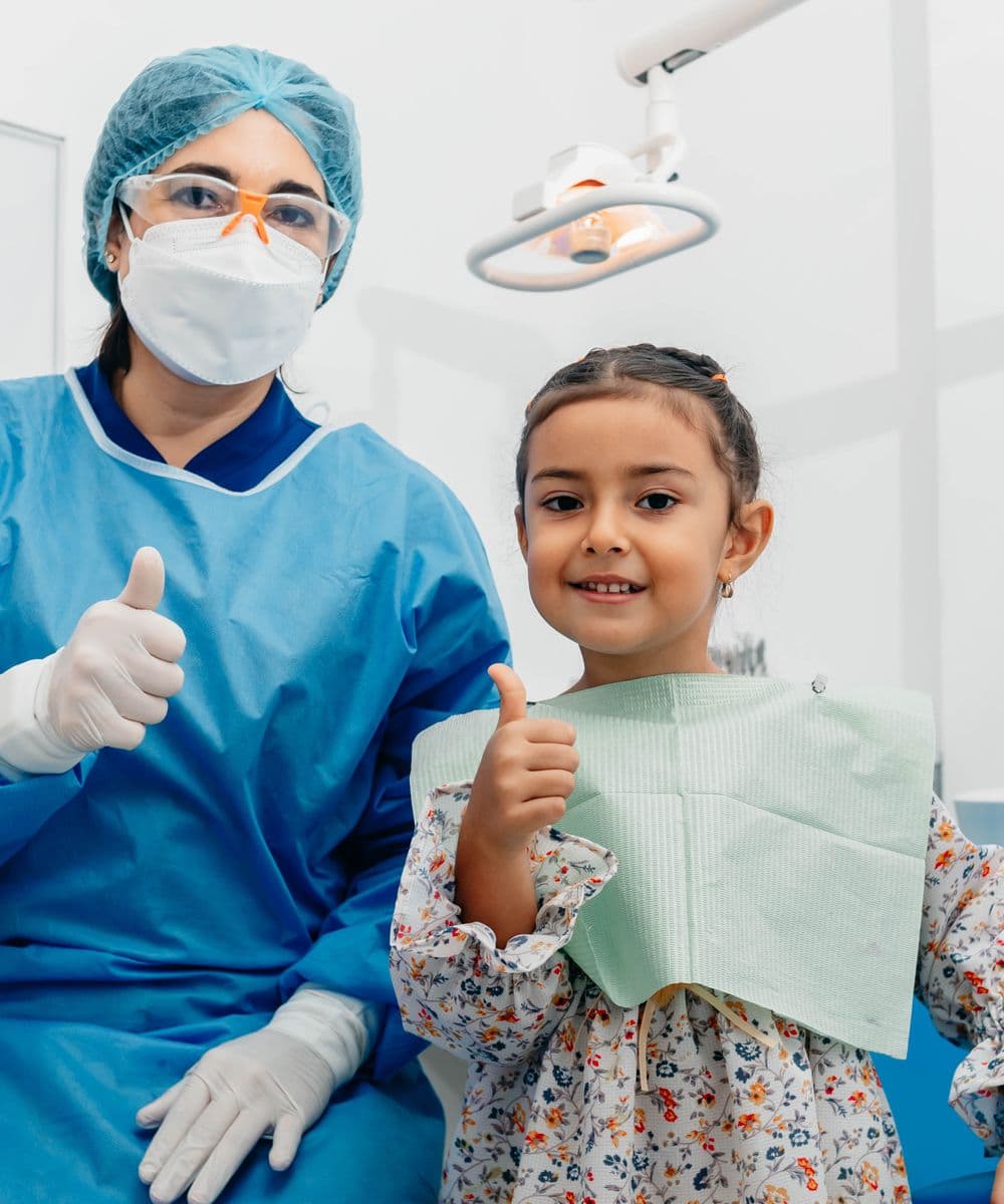 A Northline Dental clinician with a happy young patient